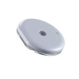 Close-up ronde lichtgrijze Accu-Chek SmartGuide glucosesensor