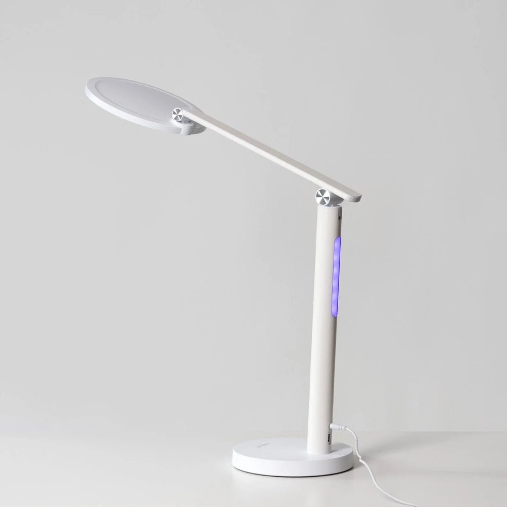 Innolux Oslo lamp met paars lichtpaneel en omhoog gekantelde arm