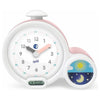 Roze witte Kid'Sleep kinderwekker met dag-nacht symbool en digitale display