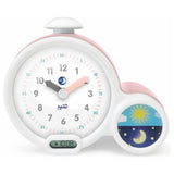 Roze witte Kid'Sleep kinderwekker met dag-nacht symbool en digitale display