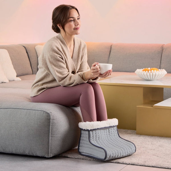 Medisana FWS 120 voetenwarmer in gebruik vrouw