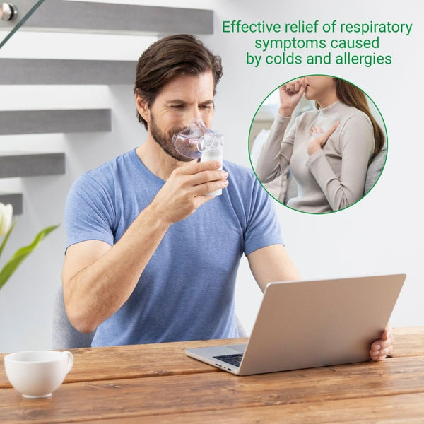 Medisana inhalator gebruik man en laptop