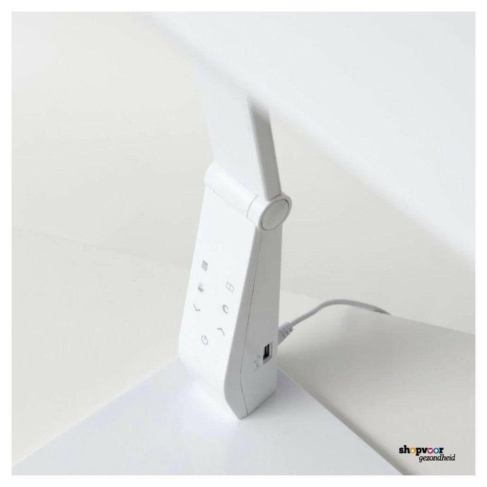 Close-up bedieningspaneel en USB-poort van witte Innolux bureaulamp