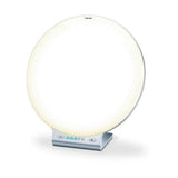 Beurer TL70 daglichtlamp aan met warme gloed en logo