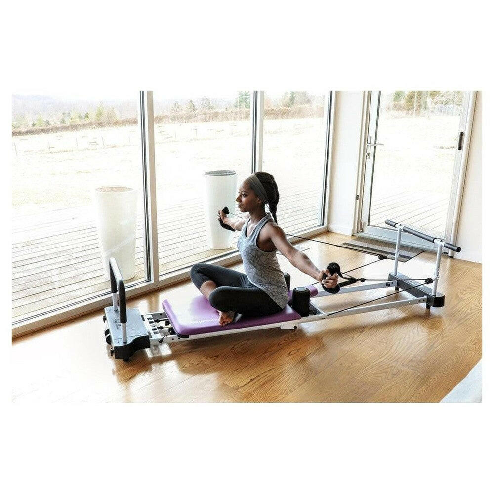 Bodi-Tek Aeropilates 435 pilatesbank paars in woonkamer met weerstandssysteem