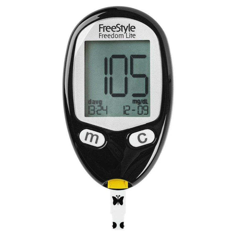 Actief scherm van FreeStyle Freedom Lite meter met witte teststrip erin