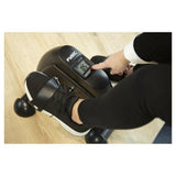 Close-up van rode knop op Fysic FW12 fietstrainer display