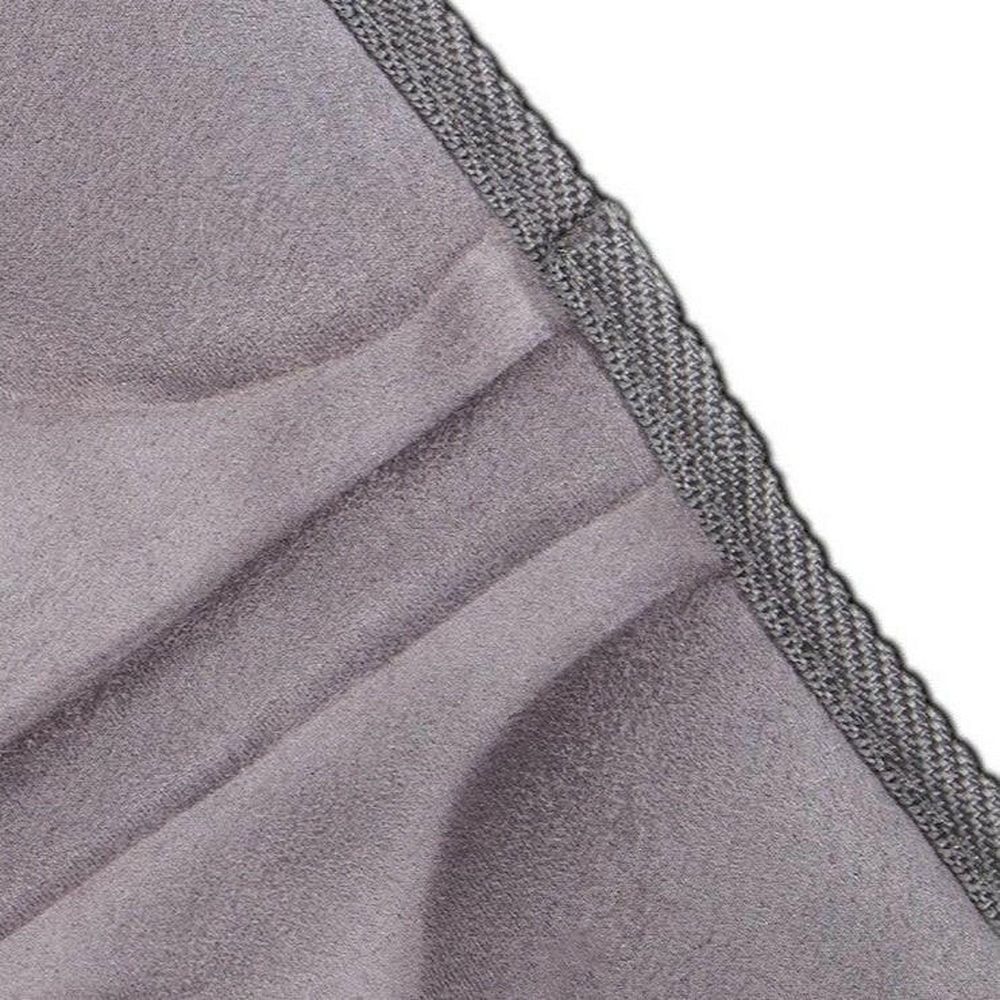 Close-up fluwelen textuur grijze massagekussen rand detail