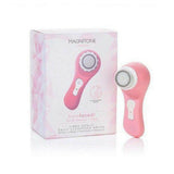 roze Magnitone Barefaced gezichtsborstel naast verpakking met productnaam