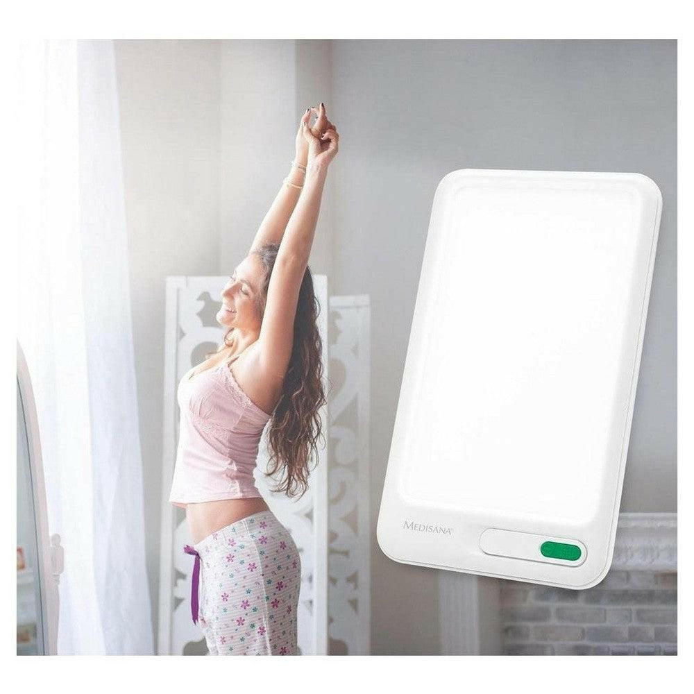 Medisana daglichtlamp tabletformaat in slaapkamer voor winterblues
