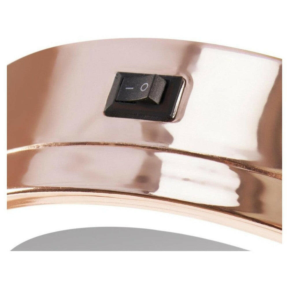 Roze-gouden make-upspiegel close-up met LED-schakelaar