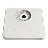 Voorzijde witte analoge weegschaal Soehnle Tempo met boltextuur, rode wijzer en max 130 kg capaciteit
