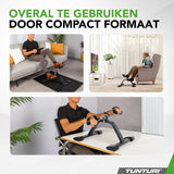 Tunturi Mini Bike Pro in gebruik onder bank, naast TV en aan tafel voor diverse training