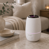 Witte Clean Air Optima aroma diffuser met paarse LED-ring en stoom, voor ontspanning