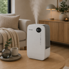 Clean Air Optima CA-607W witte luchtbevochtiger met ionisator en stoomstraal op salontafel