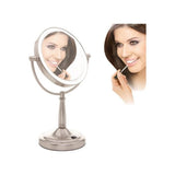 Vrouw past lippenstift aan bij Impulsion vergrotende make-upspiegel met LED