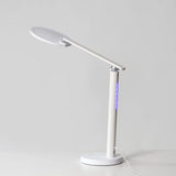 Innolux Oslo lamp met paars lichtpaneel en omhoog gekantelde arm