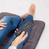 Grijs massagekussen met afstandsbediening voor nek en rug ontspanning