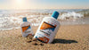 TravelSafe zonnebrandcrème SPF 50 en aftersun op het strand met condensdruppels