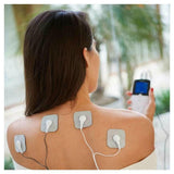 Beurer EM49 TENS-EMS apparaat in gebruik op rug voor pijnbestrijding met vier elektroden