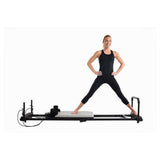 Pilatesbank AeroPilates 435 paars met gewichten en weerstandskabels