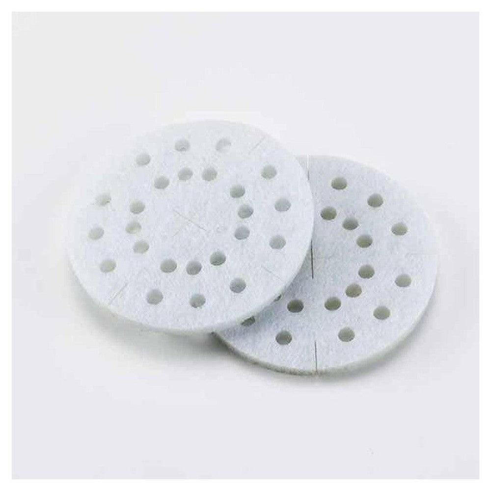Witte ronde anti-kalk pads van Boneco A451 met gaten voor makkelijke aanpassing