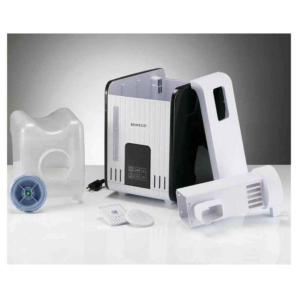 Ontpakt Boneco S450 stoombevochtiger met losse onderdelen en waterreservoir