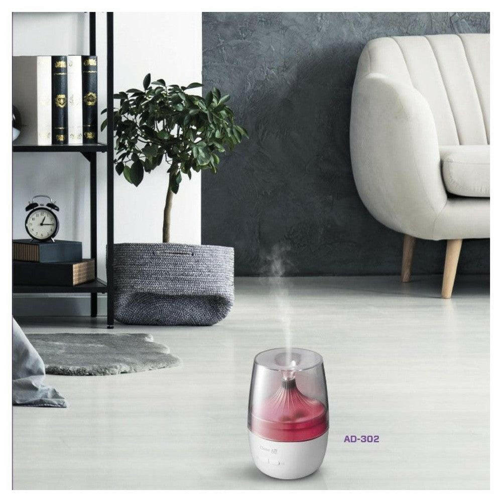 Clean Air Optima AD-302 aroma diffuser in woonkamer met rood licht en stoom