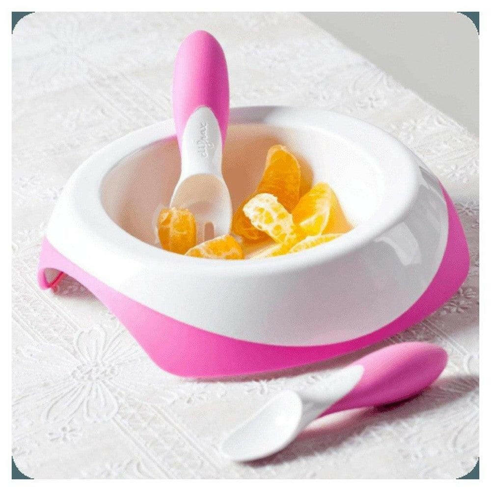 Roze Difrax peuterkom gevuld met fruit inclusief antislip lepel