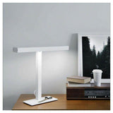 Innolux daglichtlamp met dimfunctie op houten bureau