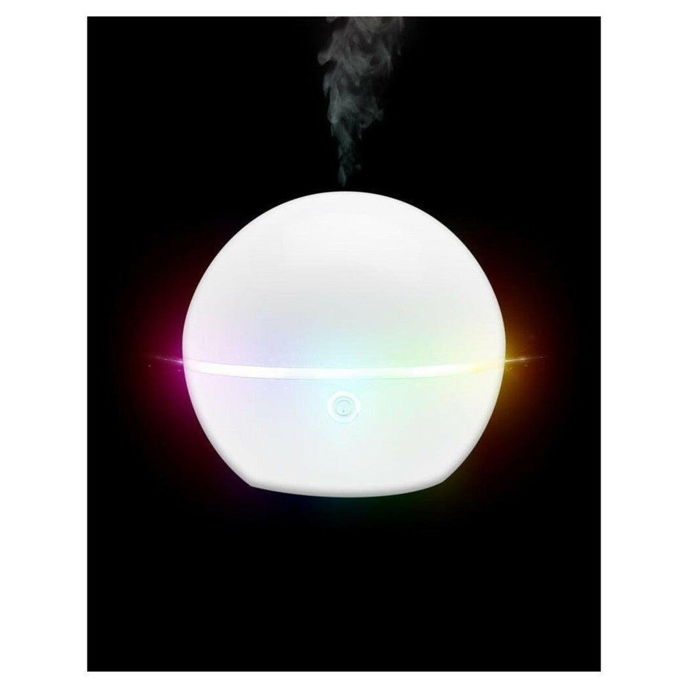 Lanaform Bali aroma diffuser met regenboogkleurig licht en nevel op donkere achtergrond