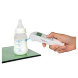 Contactloze koortsmeting babyfles met Microlife NC150 voorhoofdthermometer blauw licht