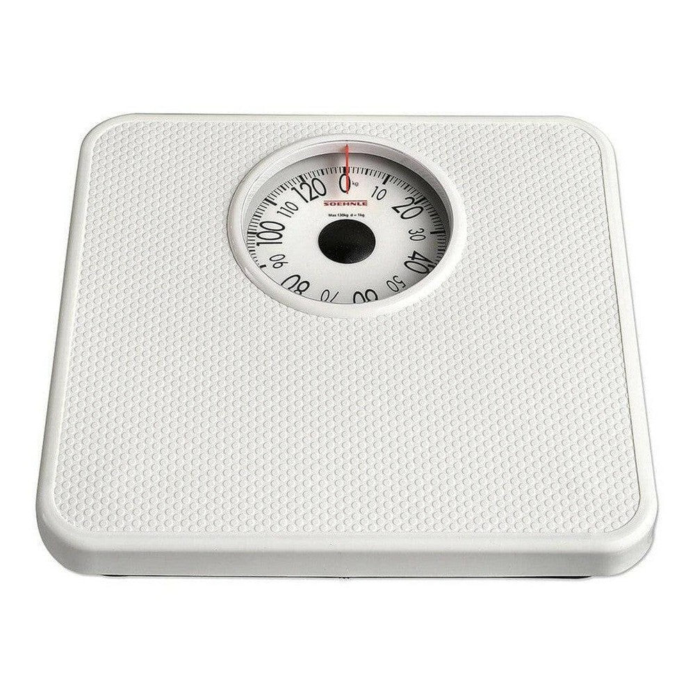 Voorzijde witte analoge weegschaal Soehnle Tempo met boltextuur, rode wijzer en max 130 kg capaciteit