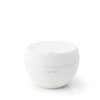Witte bolvormige Stadler Form Jasmine aroma diffuser met matte afwerking en bedieningsknoppen