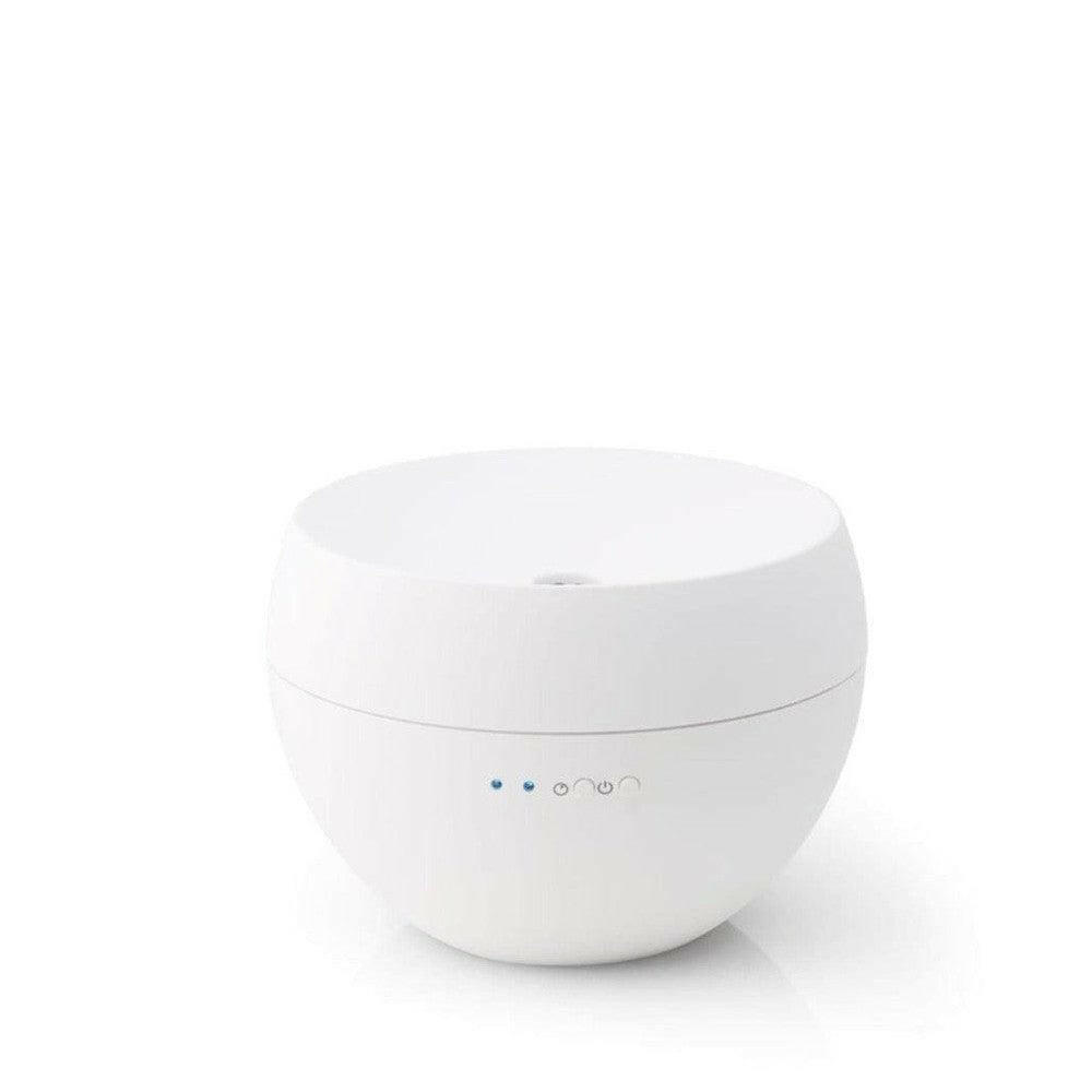 Witte bolvormige Stadler Form Jasmine aroma diffuser met matte afwerking en bedieningsknoppen