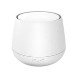 Bolvormige witte Stadler Form Julia diffuser met gladde afwerking en bedieningsknoppen