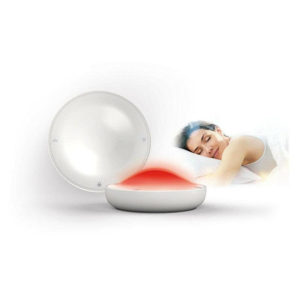Witte ronds apparaat Terraillon Dreamer met blauw licht op bureau bij werkplek