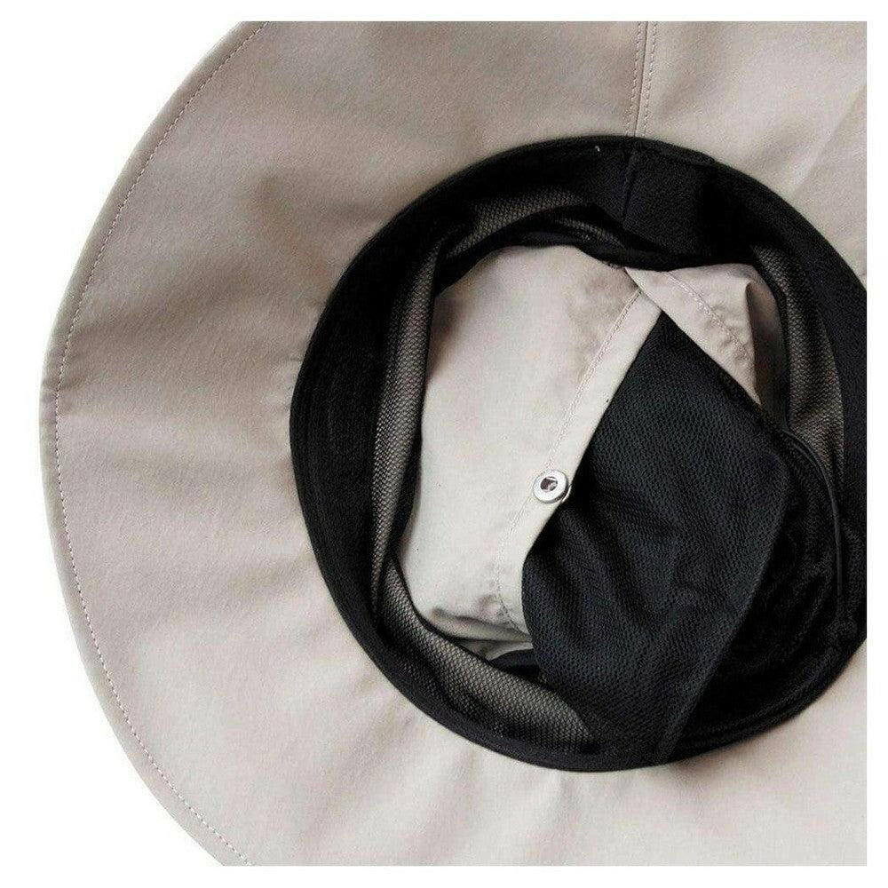 Detail zwart mesh insectenbescherming aan binnenrand beige hoed